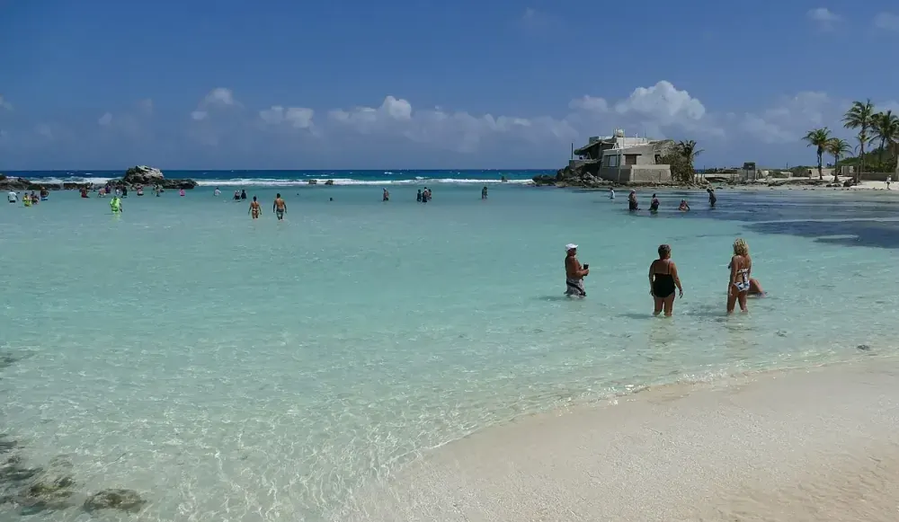 Playa Norte beach on Isla Mujeres with crystal-clear turquoise Caribbean water